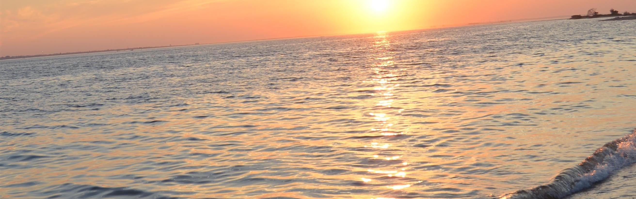 Sunset over water.