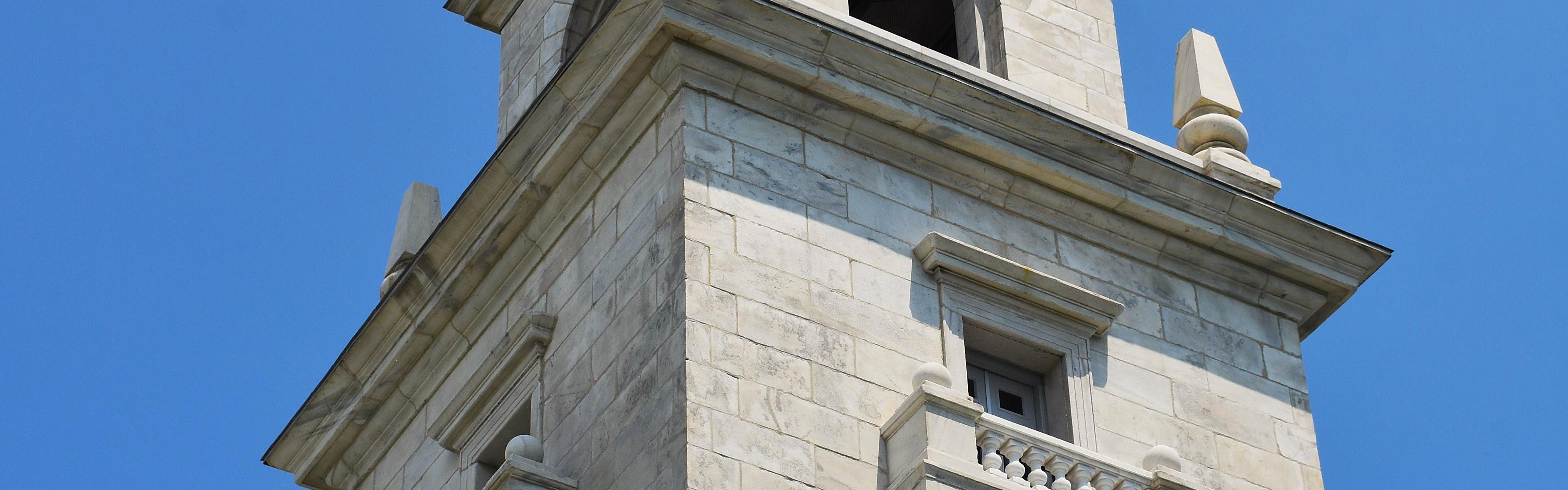 View up to the top of the Dorchester Heights Monument, a steeple looking monument.
