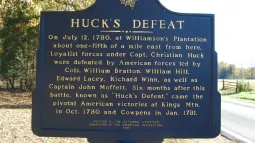 Image of a historical marker sign denoting Huck's Defeat