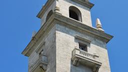 View up to the top of the Dorchester Heights Monument, a steeple looking monument.