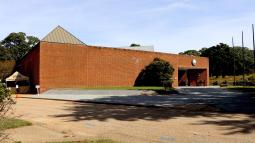 the Yorktown Battlefield Visitor Center.   A large brick building with National Park Arrowhead on it