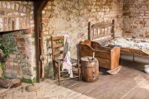 interior view of a restored slave cabin