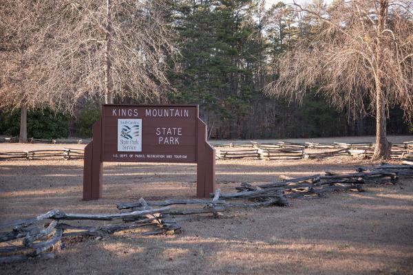 a photo of the entrance sign to Kings Mountain State Park