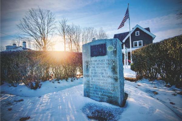 This picture shows a commemorative marker in the snow highlighting the location as a stop on Henry Knox's noble train of artillery. 