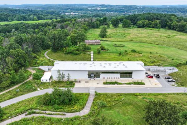 Aerial shot of Ganondaga State Historic Site with museum and longhouse in view