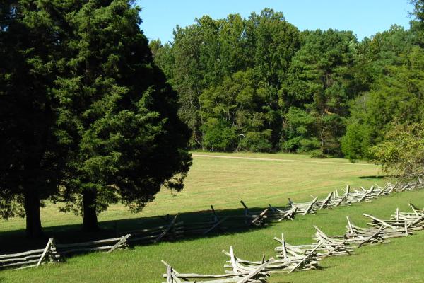 Photograph of fences lining Surrender Field at Yorktown