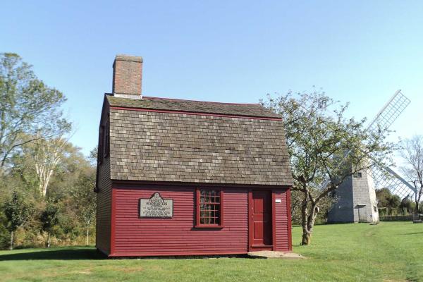Red wooden building used as headquarters for General Prescott