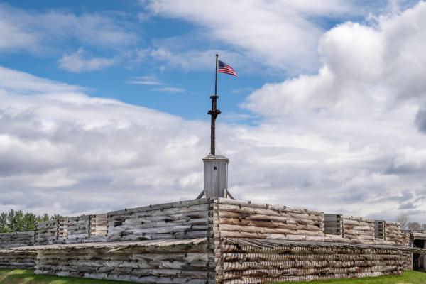 A view of the fort flagpole from outside. The fort almost looks like a big wooden ship under it.