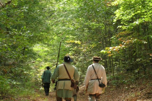 Reenactors march along the historic trail at Alexander's Ford in North Carolina.