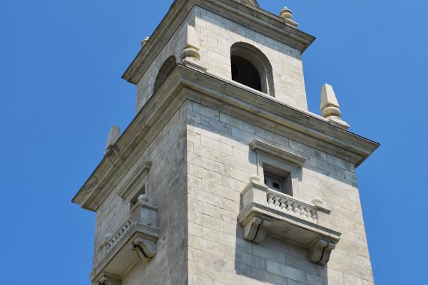 View up to the top of the Dorchester Heights Monument, a steeple looking monument.