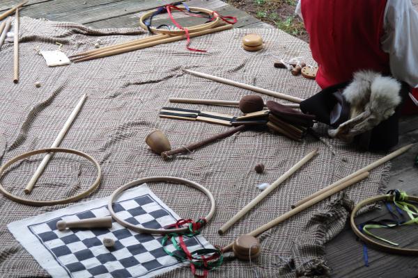 Colonial toys spread out on a cloth