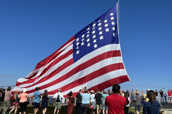 Raising the flag during First Shot events