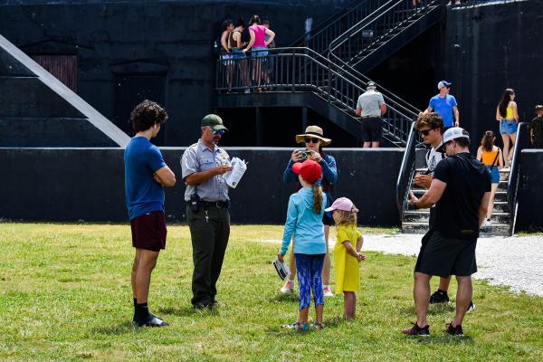 NPS Ranger speaks with a familly