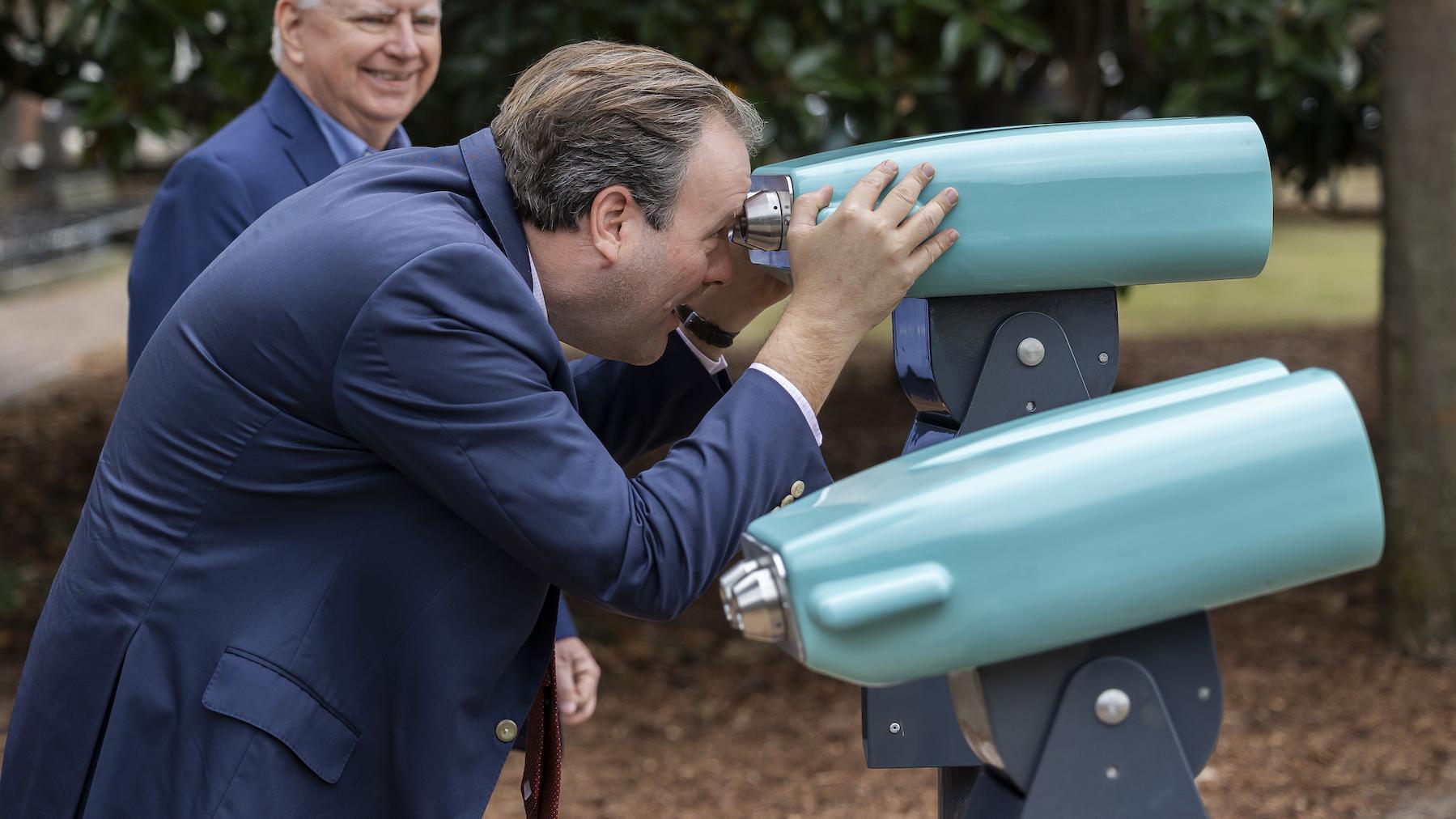 Charleston Mayor William Cogswell Looks through the AR Binoculars