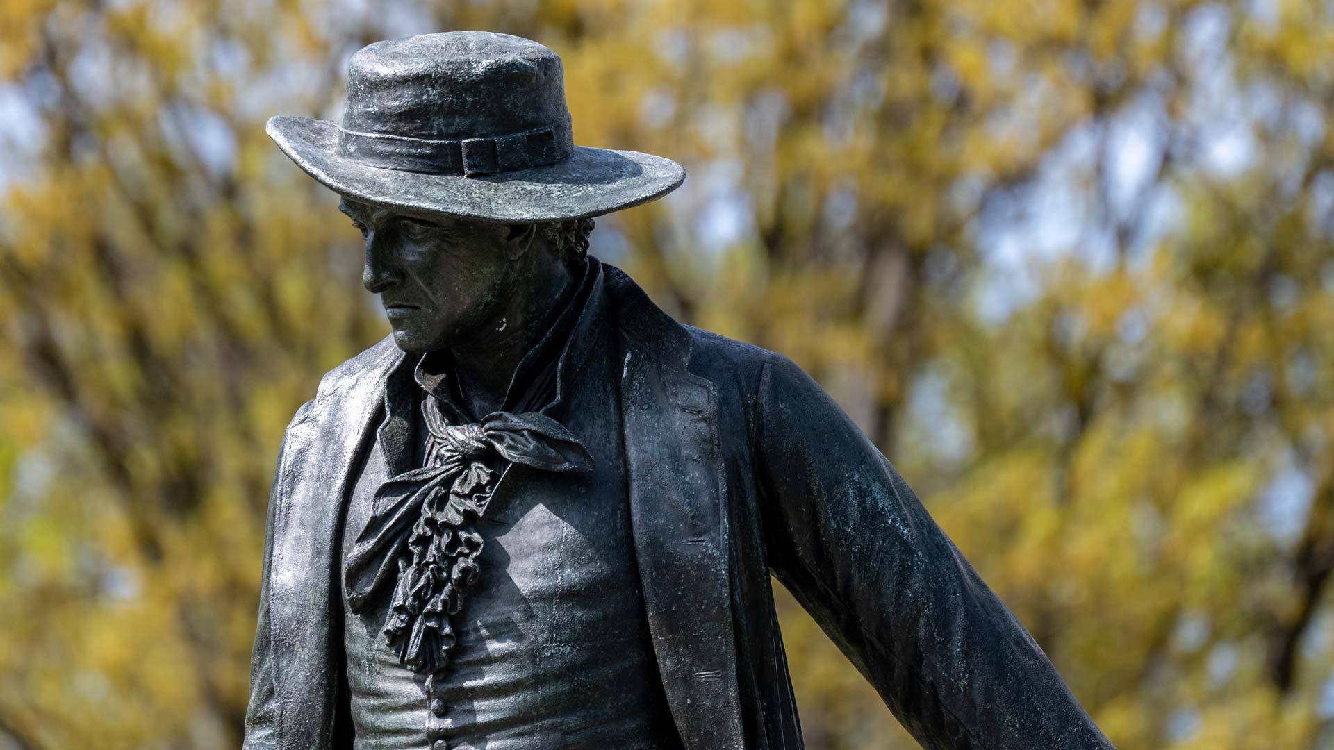 Statue of Colonel William Prescott in front of the Bunker Hill Monument