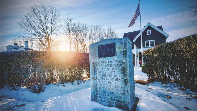 This picture shows a commemorative marker in the snow highlighting the location as a stop on Henry Knox's noble train of artillery. 