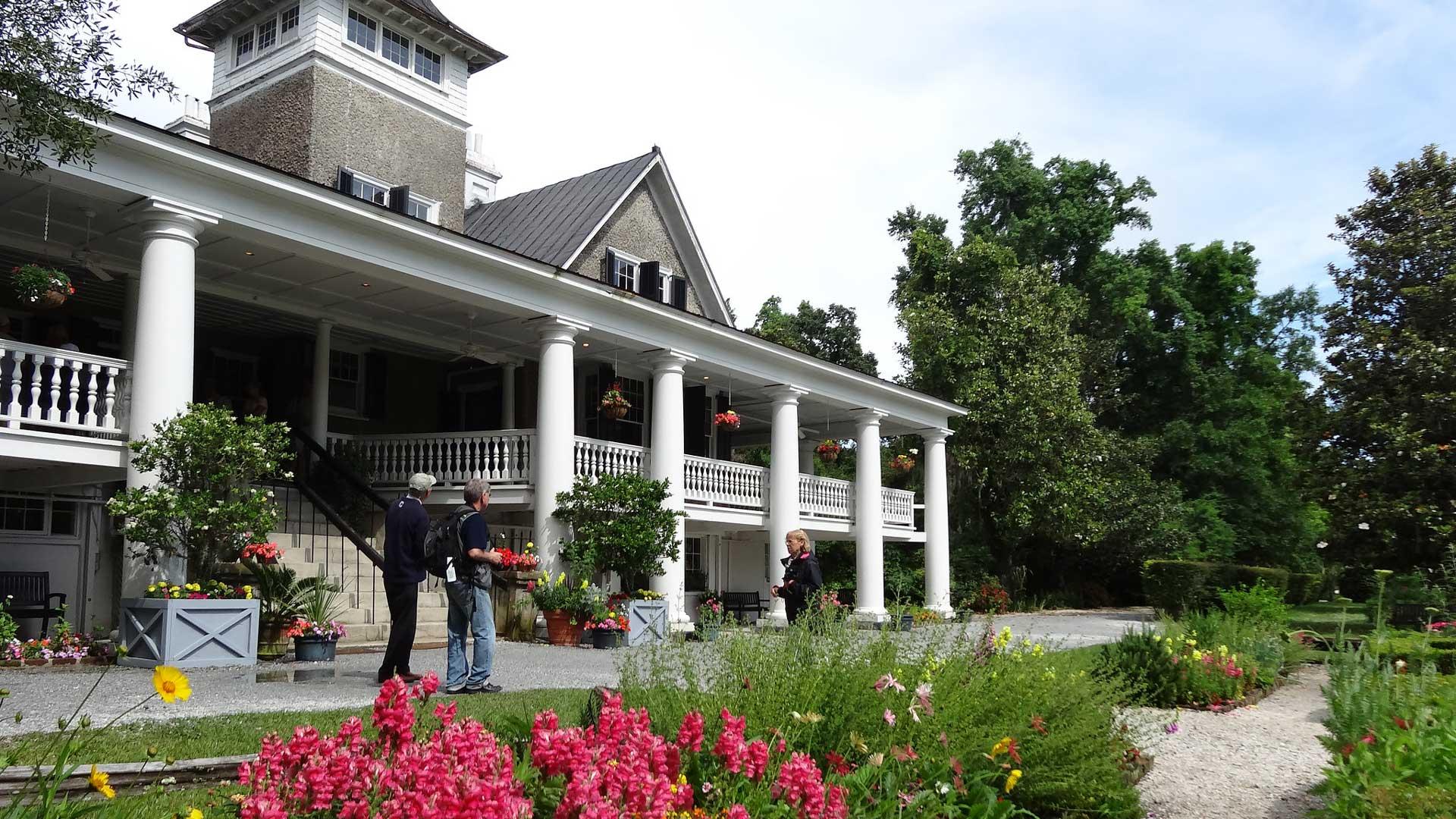 Facade of Magnolia Plantation with flowers