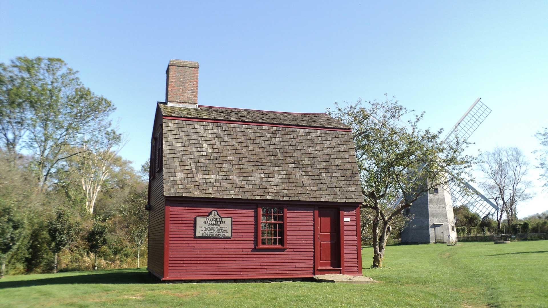 Red wooden building used as headquarters for General Prescott